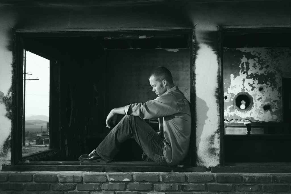 black and white man young lonely